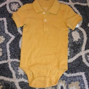 Brand new mustard color Carter’s 18mo onesie